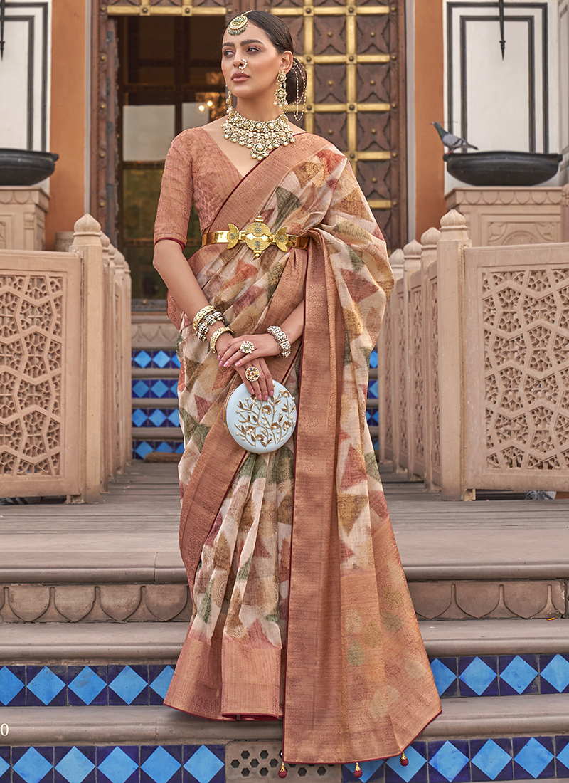 Featuring an orange organza saree paired with a chanderi silk blouse with  antique gold dori, aari and embellished hand work. Jewellery:… | Instagram