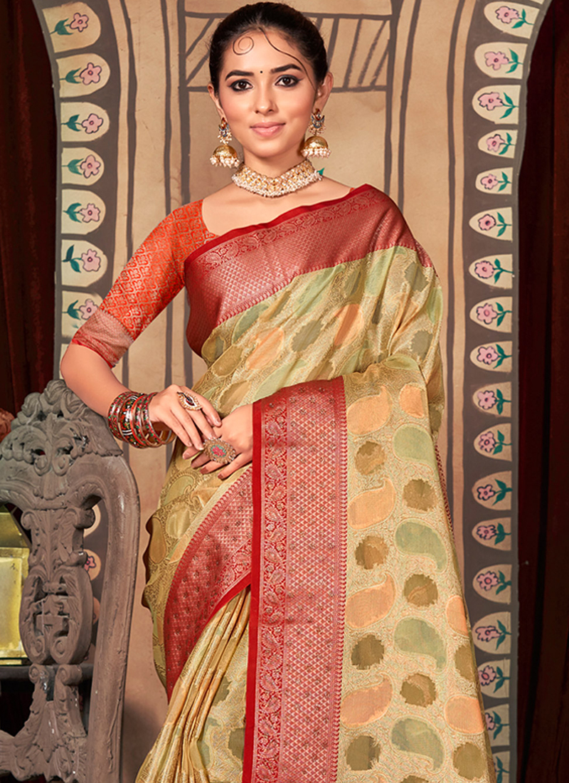 Mishrita cream organza saree with red kanchi silk border - #SareeEnvy -  Aavaranaa