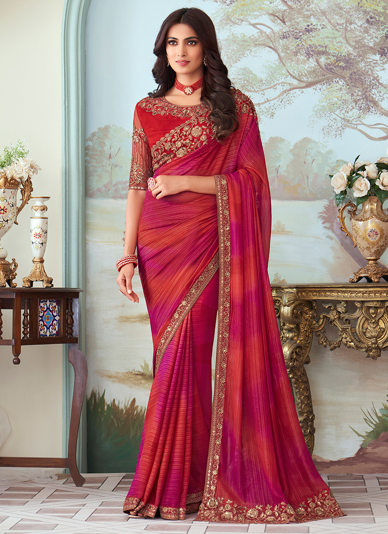 Orange embossed silk saree with double korvai borders in floral design &  pallu featuring lots of tiny flowers in zari