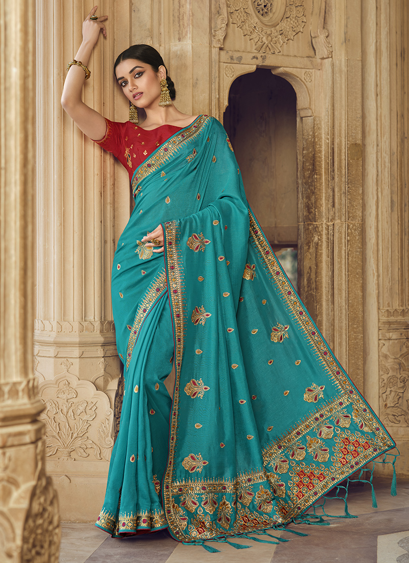 Sky-Blue Fancy Crystal Crepe Saree with Floral Motif Raw Silk Blouse and  Sequins Embroidery | Exotic India Art